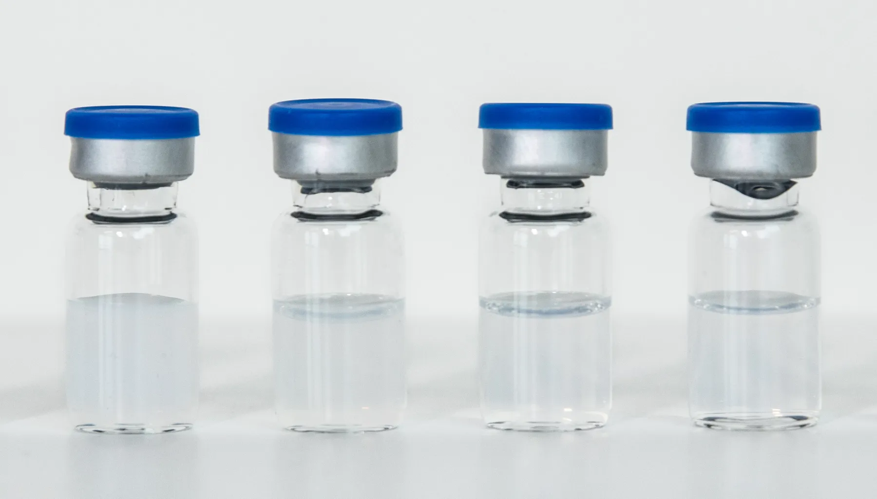 Vials housing mRNA strands