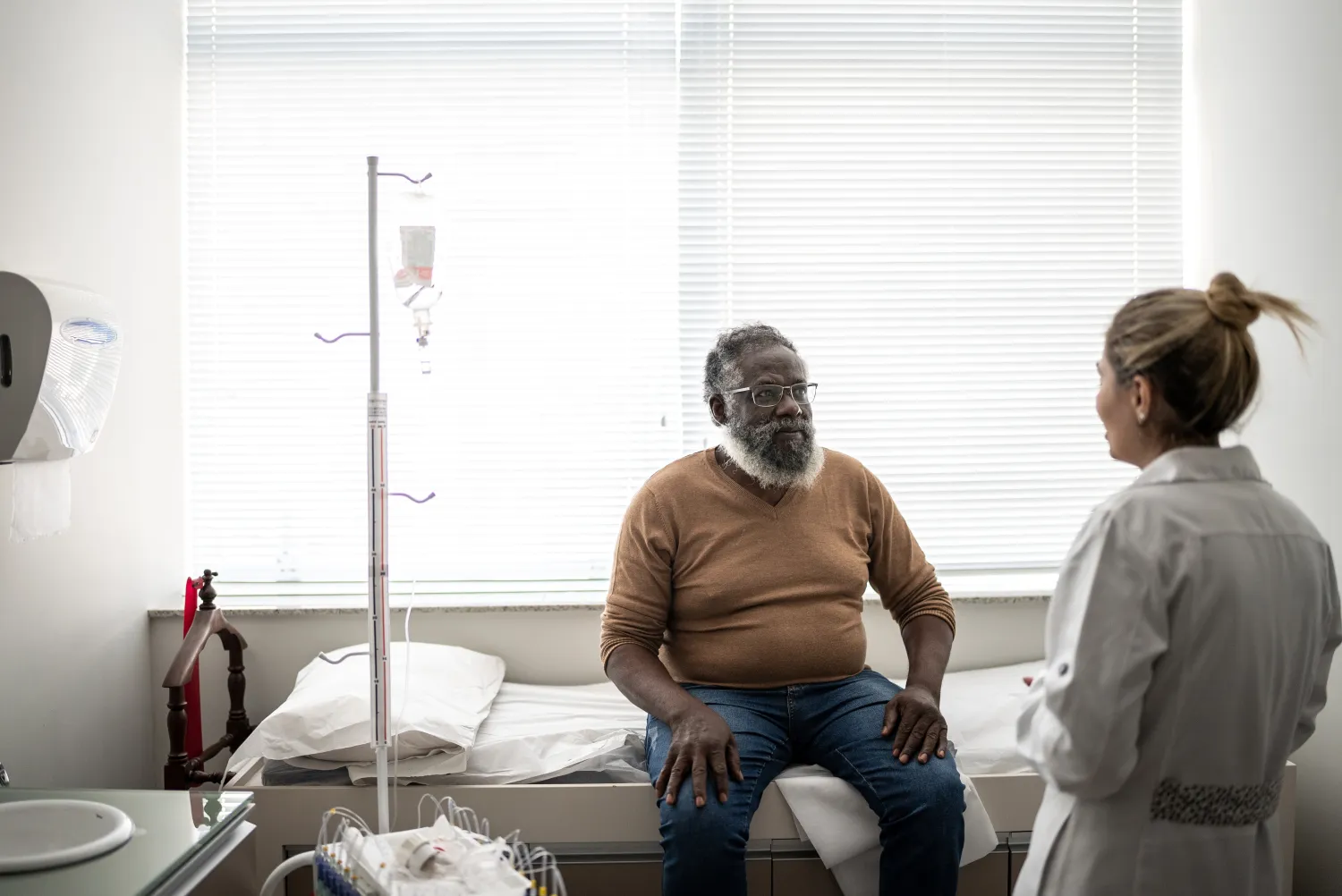 Dr. discussing options with patient at medical appointment