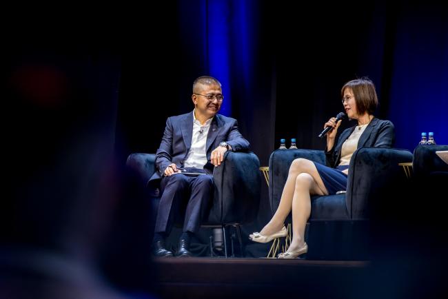 Allen Li moderates a panel at the 2026 Danaher Summit